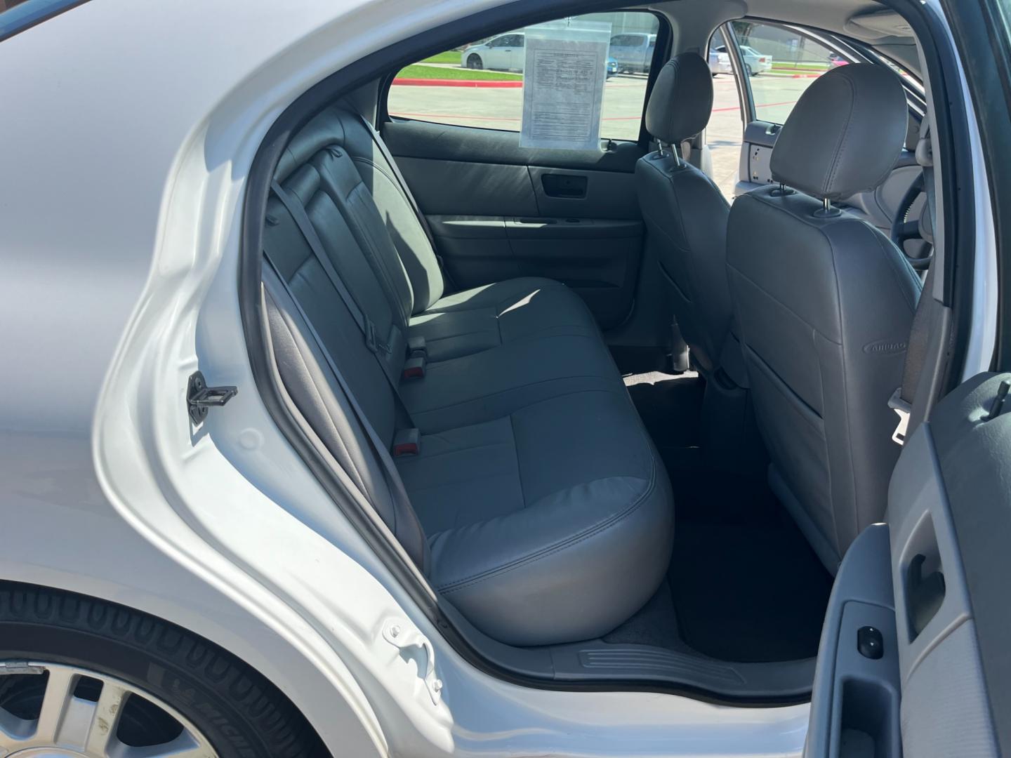 2004 white /TAN Mercury Sable LS Premium (1MEHM55S54A) with an 3.0L V6 SOHC 24V engine, 4-Speed Automatic Overdrive transmission, located at 14700 Tomball Parkway 249, Houston, TX, 77086, (281) 444-2200, 29.928619, -95.504074 - Photo#12